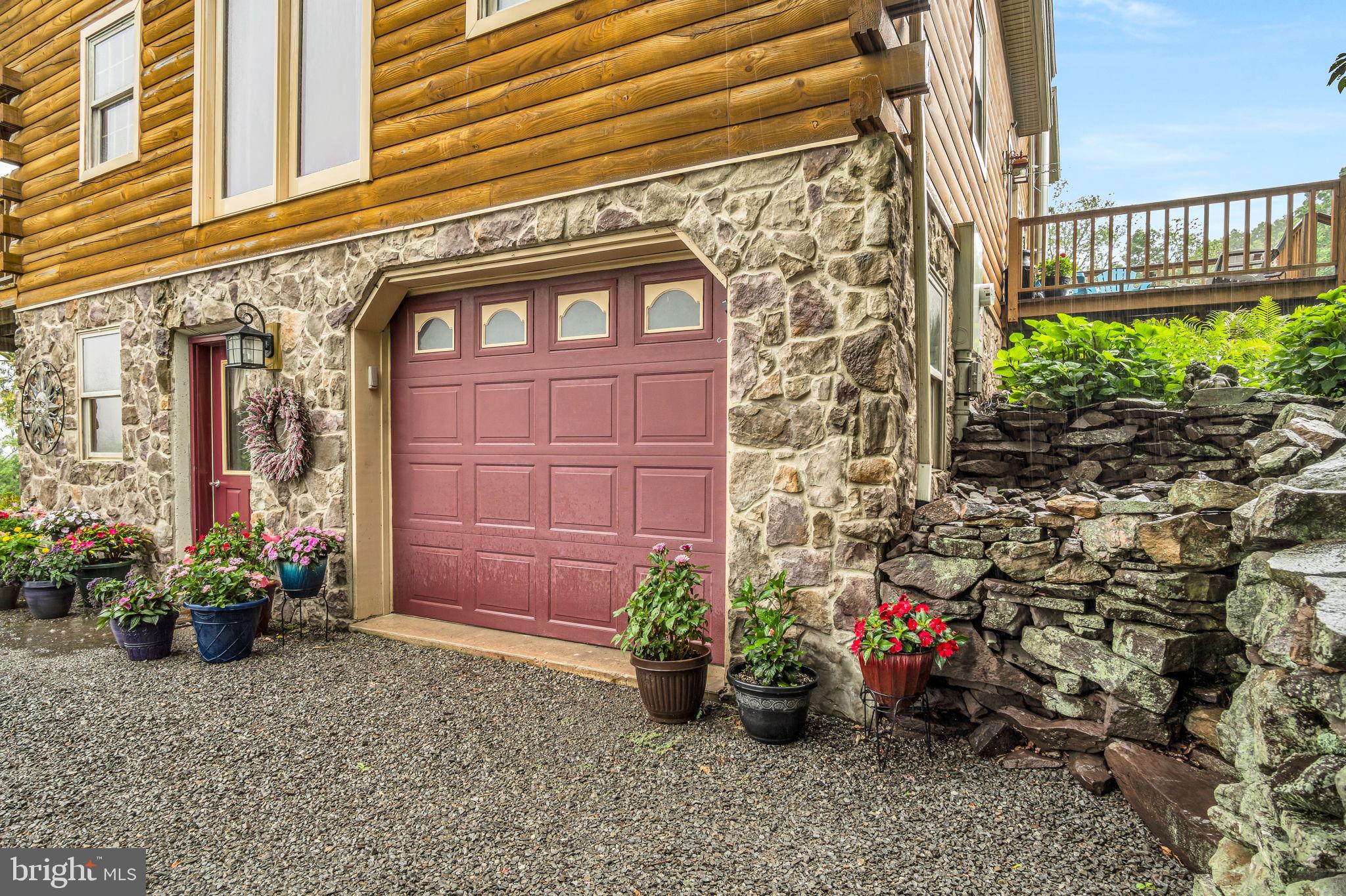 1105 Ridge Road Halifax, PA 17032 - Photo 56 of 61 a view of a house with a potted plant