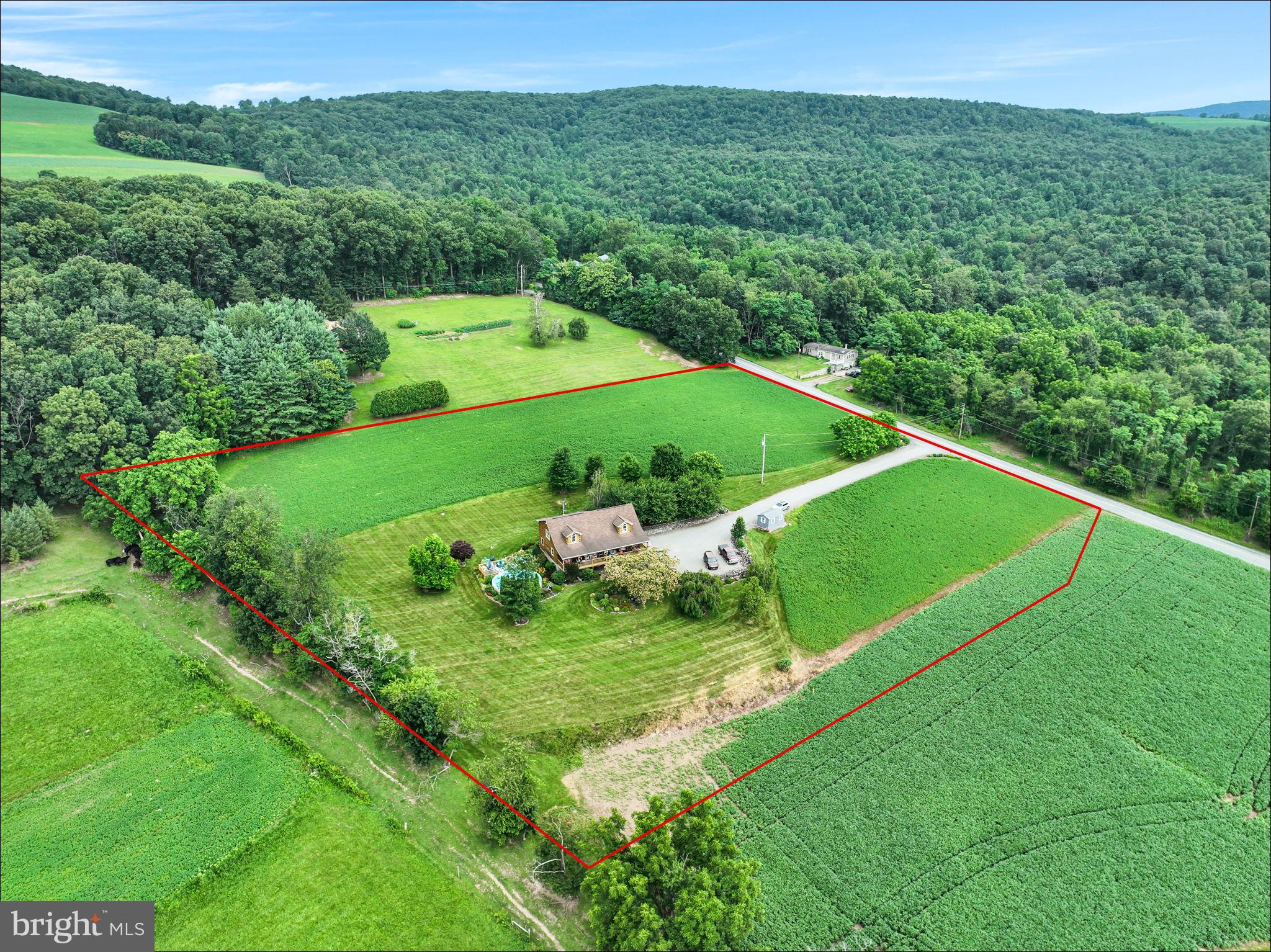 1105 Ridge Road Halifax, PA 17032 - Photo 57 of 61 a view of a garden with a building in the background