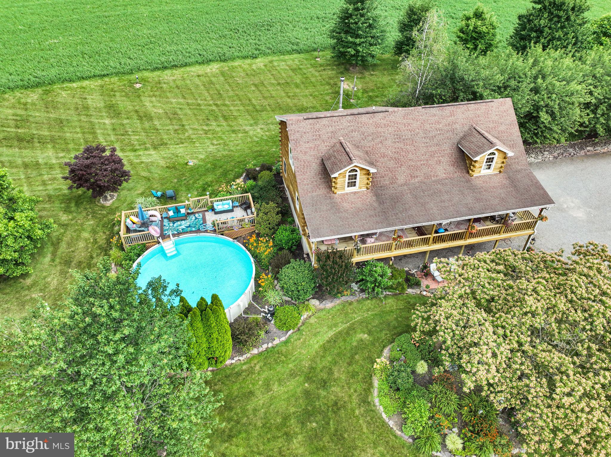 1105 Ridge Road Halifax, PA 17032 - Photo 10 of 61 an aerial view of a house with swimming pool and outdoor seating