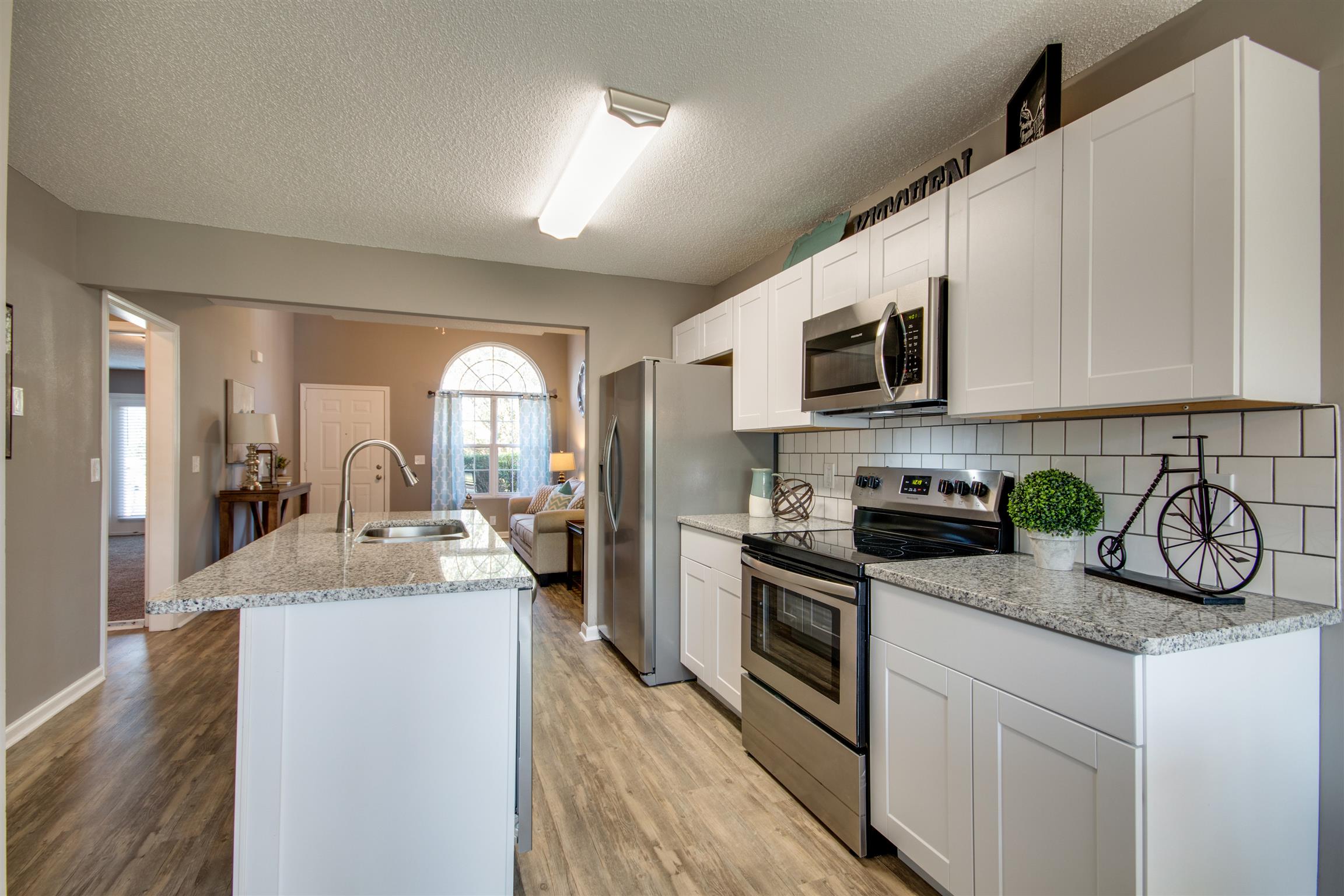 1508 Rochester Drive Murfreesboro, TN 37130 - Photo 6 of 21 Stainless appliances and tiled backsplash