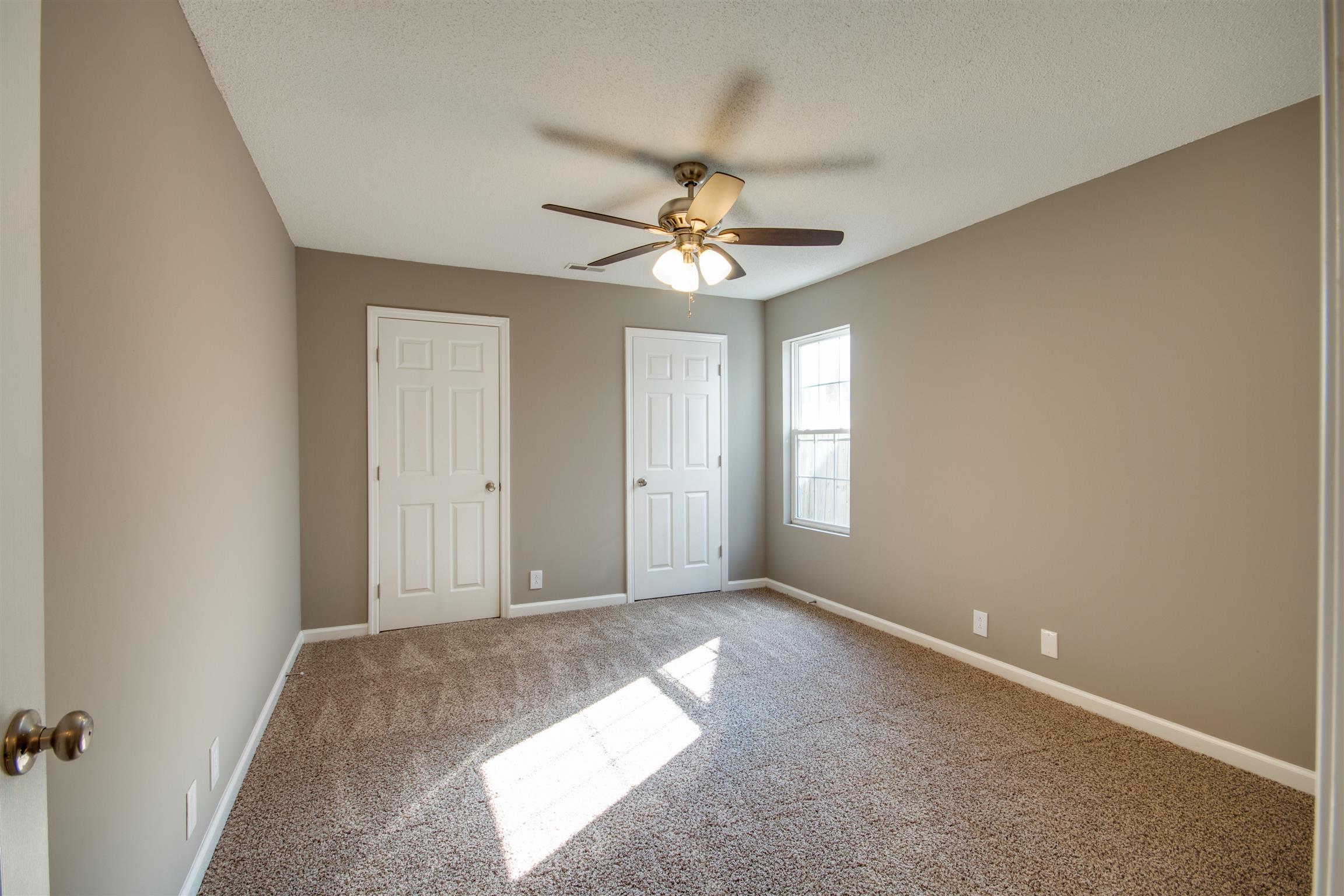 1508 Rochester Drive Murfreesboro, TN 37130 - Photo 8 of 21 The Master bedroom, located on the first floor offers new ceiling fan and side by side walk in closets!