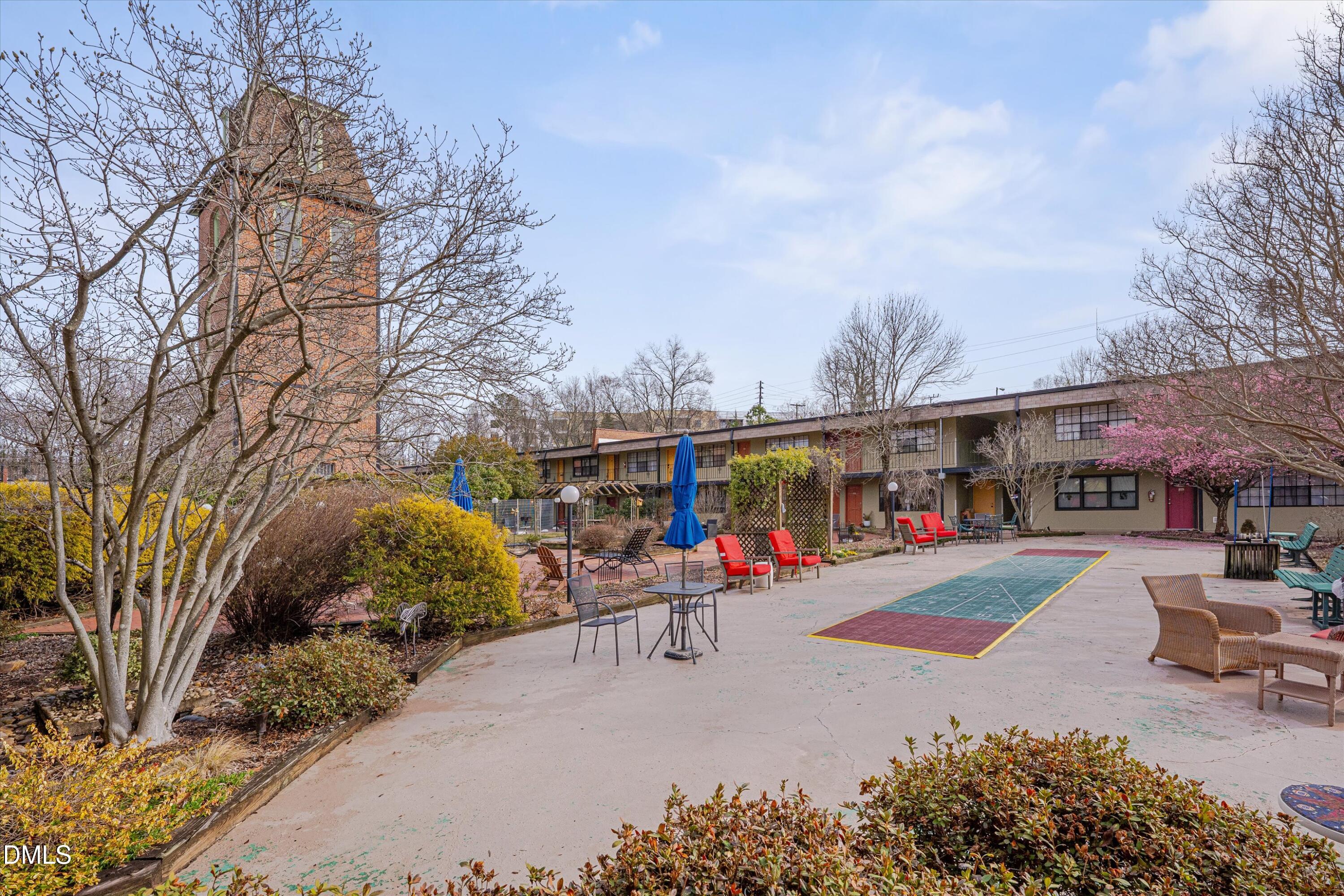 807 West Trinity Avenue, Unit 130 Durham, NC 27701 - Photo 30 of 44 a view of outdoor space with seating area