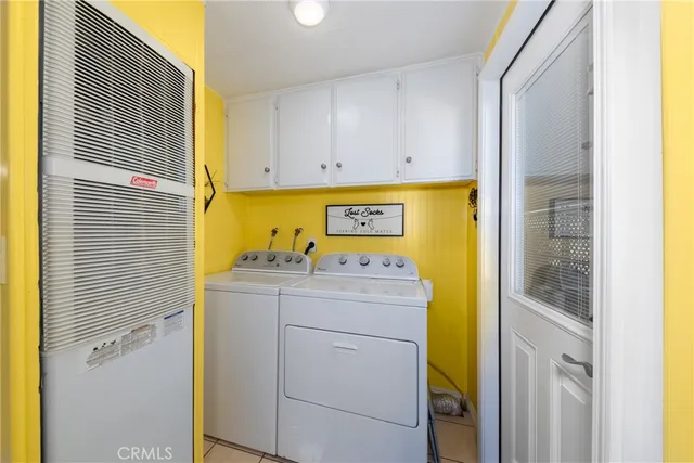 a view of a livingroom with furniture and a flat screen tv