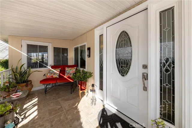 a spacious bedroom with a bed and a window