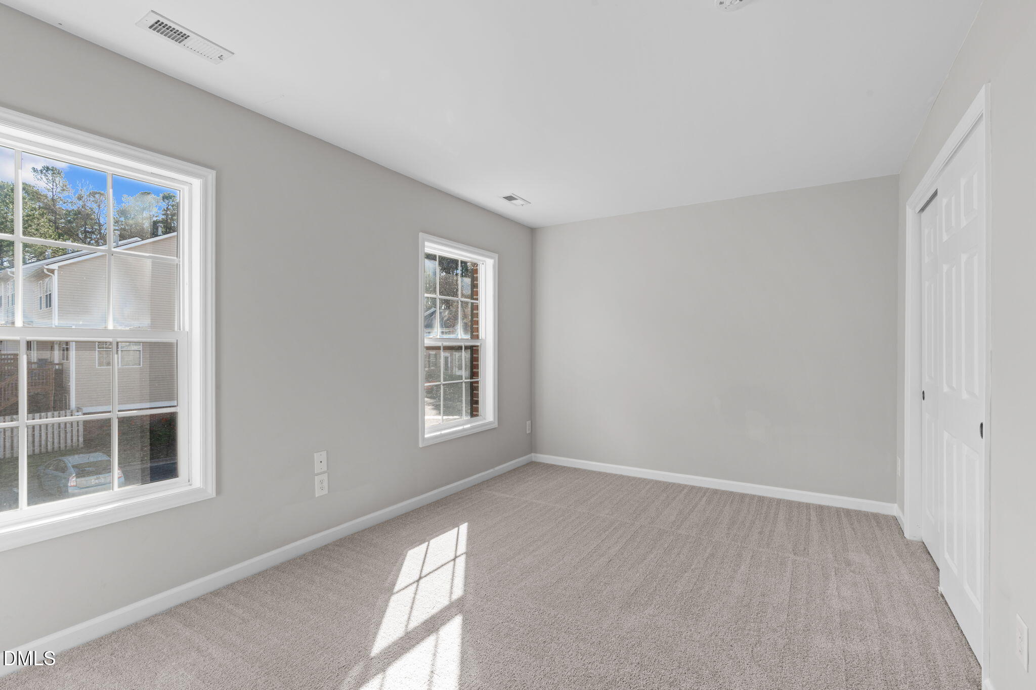5505 Crabtree Park Court Raleigh, NC 27612 - Photo 17 of 30 a view of an empty room with a window