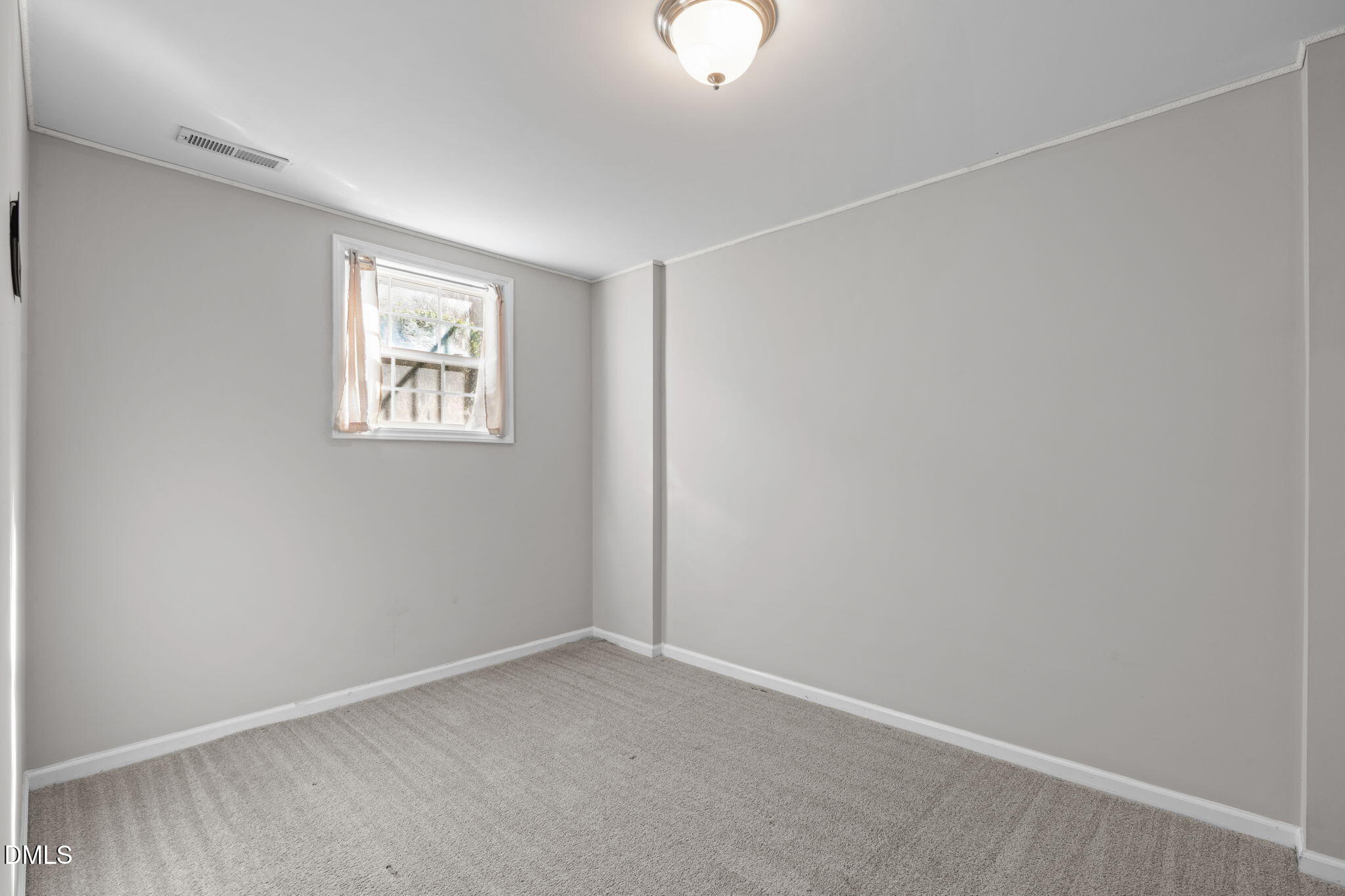 5505 Crabtree Park Court Raleigh, NC 27612 - Photo 19 of 30 an empty room with windows