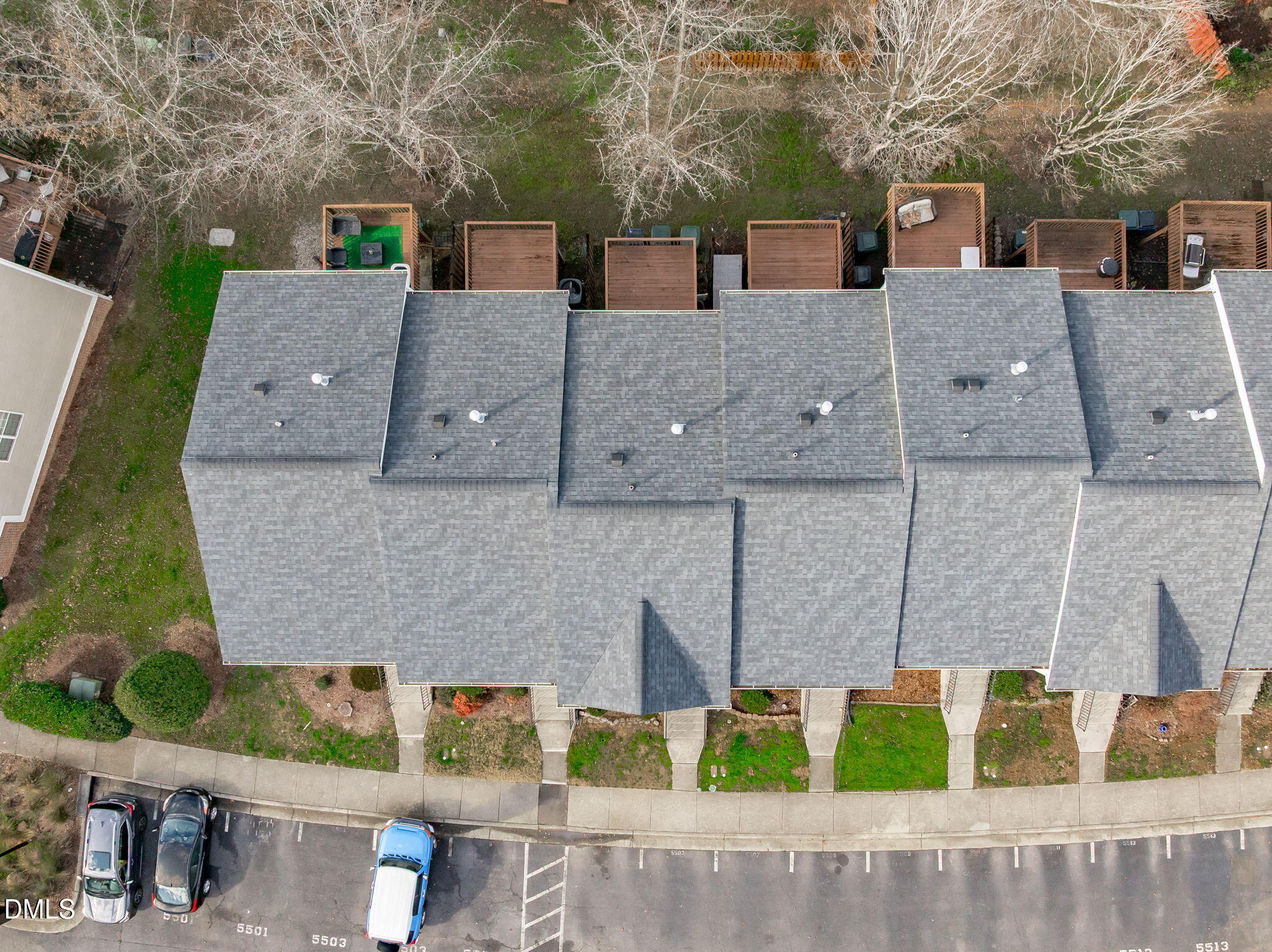5505 Crabtree Park Court Raleigh, NC 27612 - Photo 26 of 30 an aerial view of multiple houses with a yard