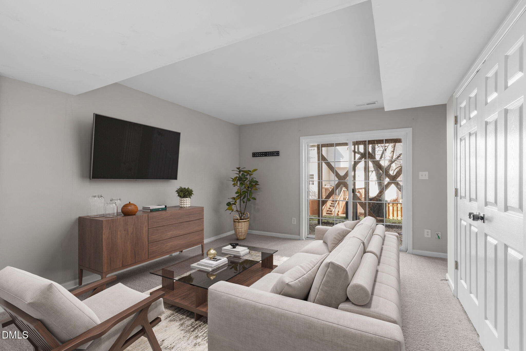 5505 Crabtree Park Court Raleigh, NC 27612 - Photo 3 of 30 a living room with furniture and a flat screen tv