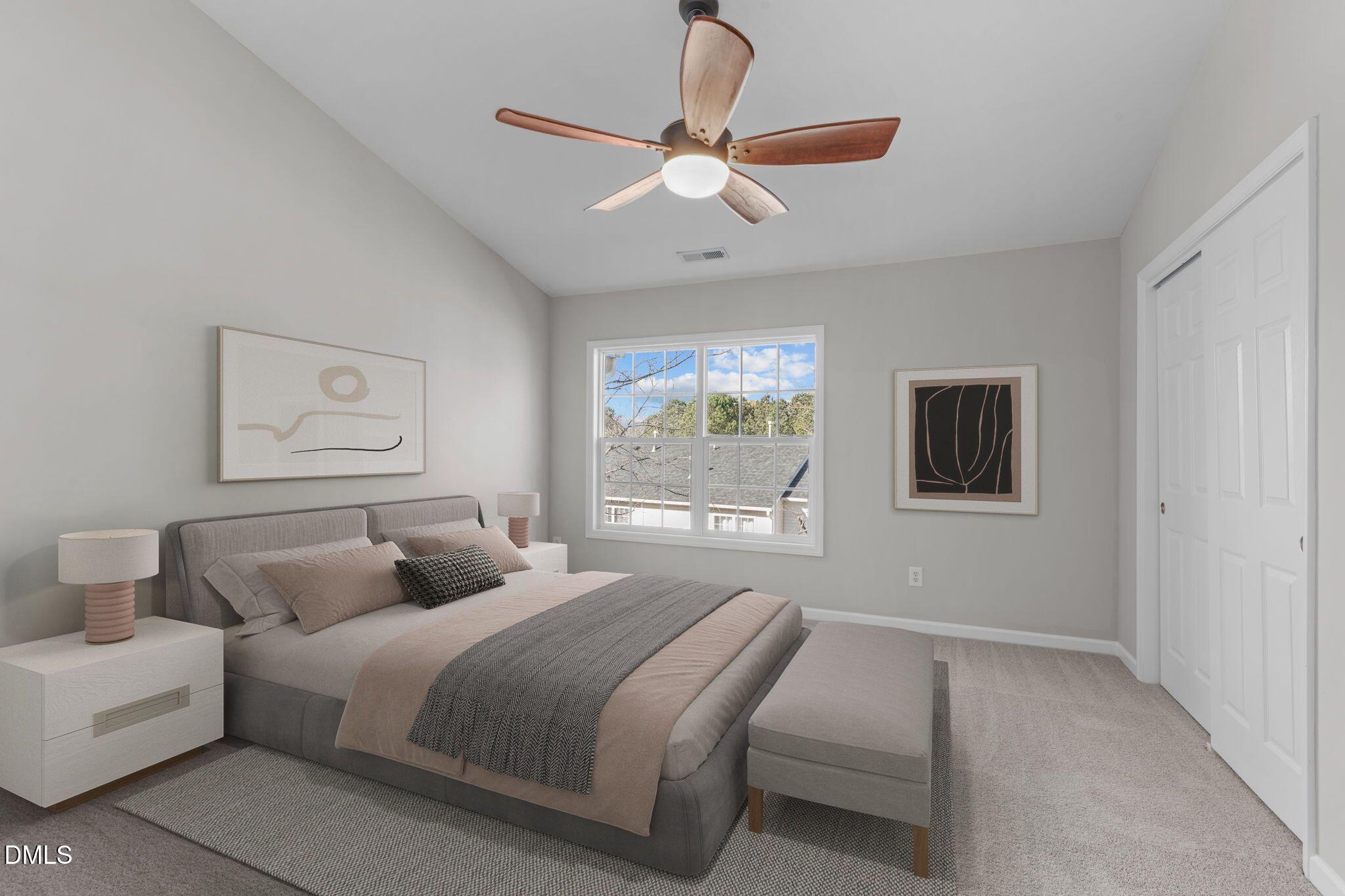 5505 Crabtree Park Court Raleigh, NC 27612 - Photo 4 of 30 a bedroom with a large bed and a window