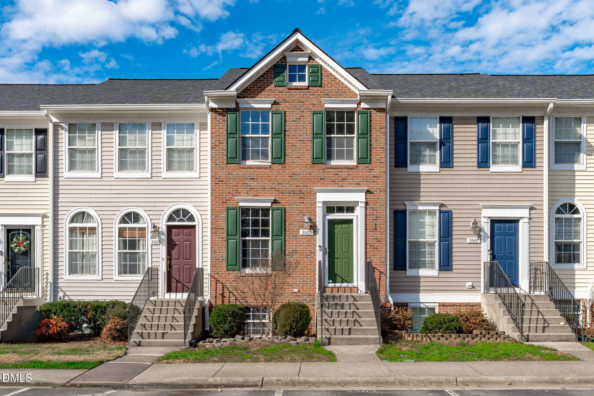 5505 Crabtree Park Court Raleigh, NC 27612 - Photo 5 of 30 a front view of a house with a yard and garage