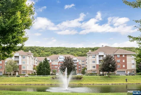 a view of swimming pool with outdoor space and seating area