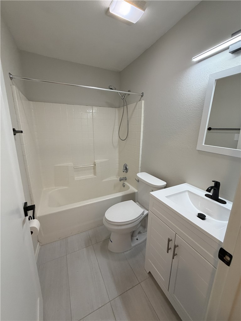 2839 Mckinzie Road, Unit 4 Corpus Christi, TX 78410 - Photo 24 of 31 a bathroom with a sink a toilet and shower