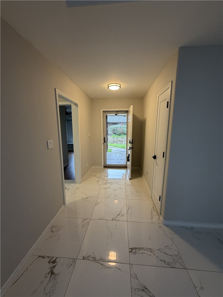 2839 Mckinzie Road, Unit 4 Corpus Christi, TX 78410 - Photo 4 of 31 a view of an empty room and a window