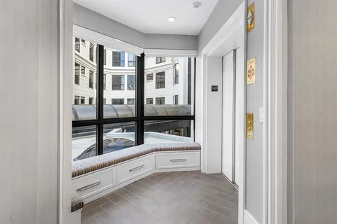 a front view of a building with large windows