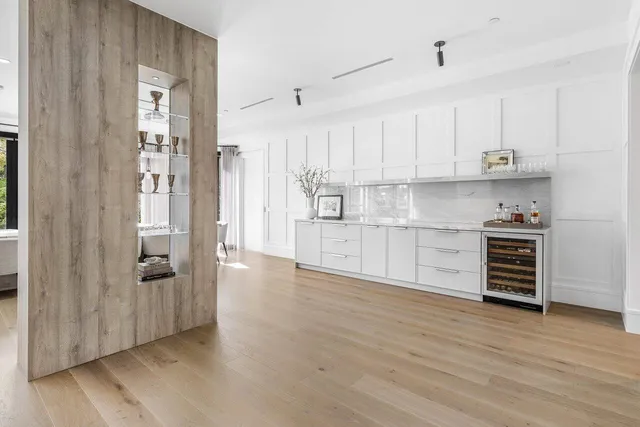 a living room with furniture and flat screen tv