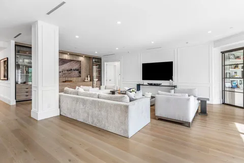 a view of living room with furniture and a window