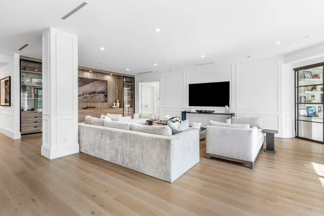 a view of living room with furniture and a window