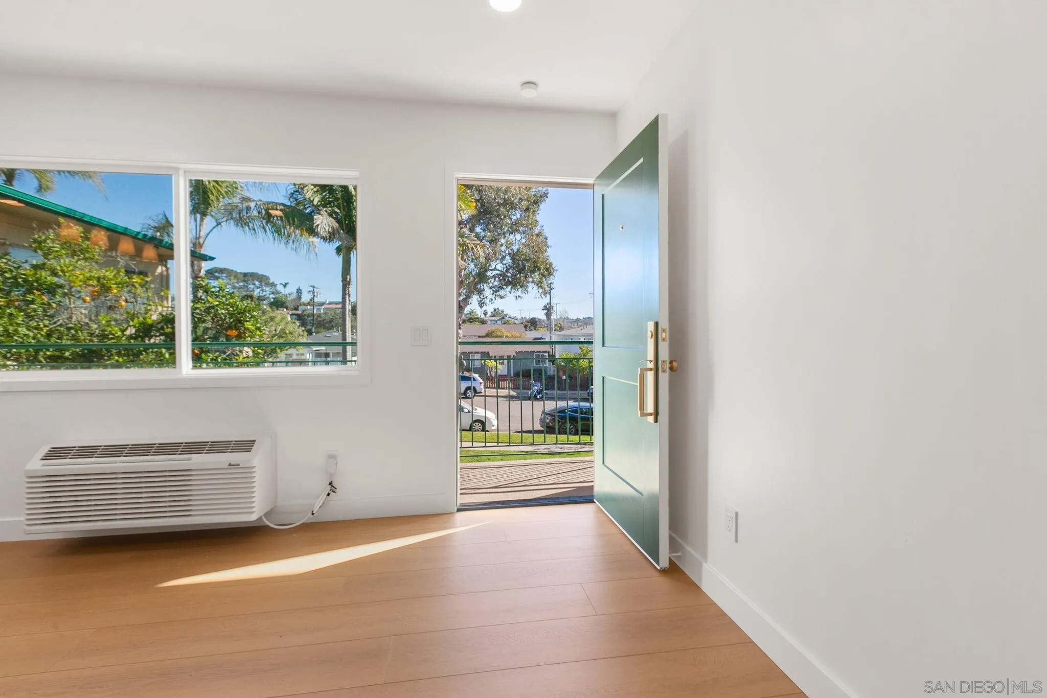 210 A Street, Unit 11 Encinitas, CA 92024 - Photo 2 of 49 a view of an empty room with a window