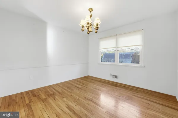 a kitchen with sink cabinets and window