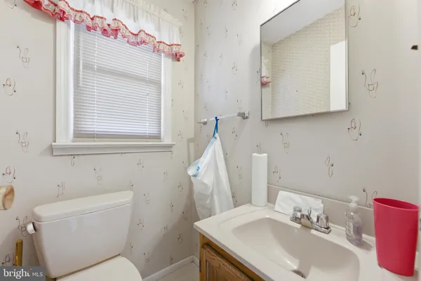 a view of a house with swimming pool and a yard