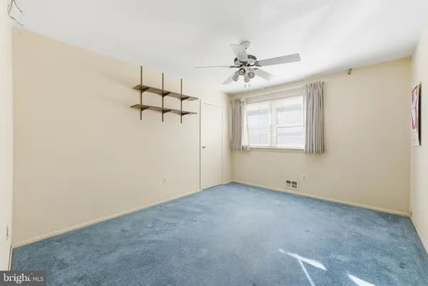 a view of livingroom with furniture wooden floor and window