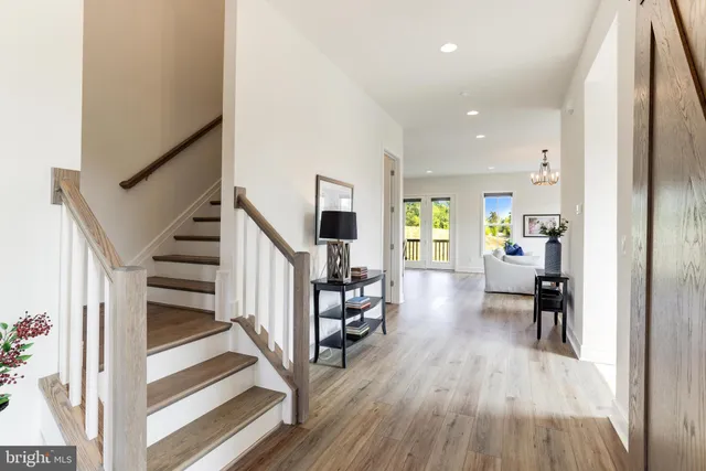 a view of a living room and dining room