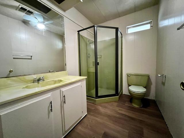 1500 Villa Avenue, Unit 23 Clovis, CA 93612 - Photo 30 of 33 a bathroom with a granite countertop sink toilet and shower