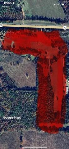 a view of a pool with a yard