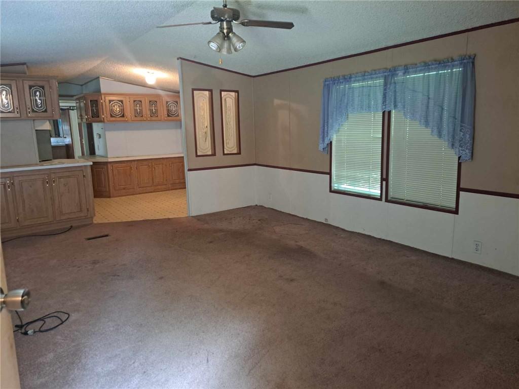 44 Adams Street McDonald, PA 15057 - Photo 8 of 30 an empty room with ceiling fan and windows