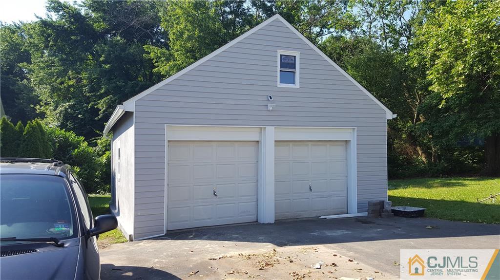87 County Road Cliffwood, NJ 07721 - Photo 22 of 25 a view of a house with a backyard