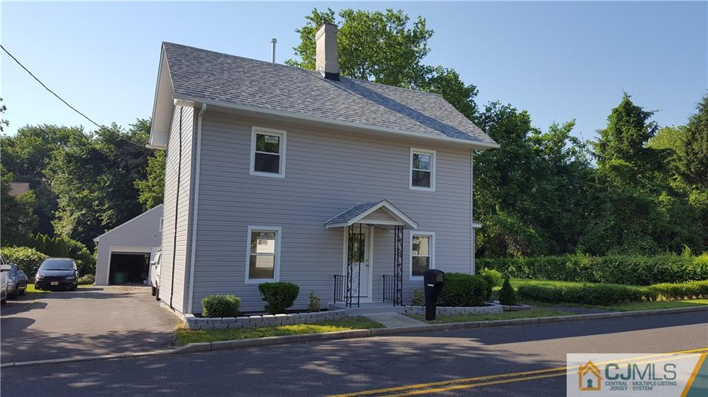 87 County Road Cliffwood, NJ 07721 - Photo 25 of 25 a front view of a house with garden