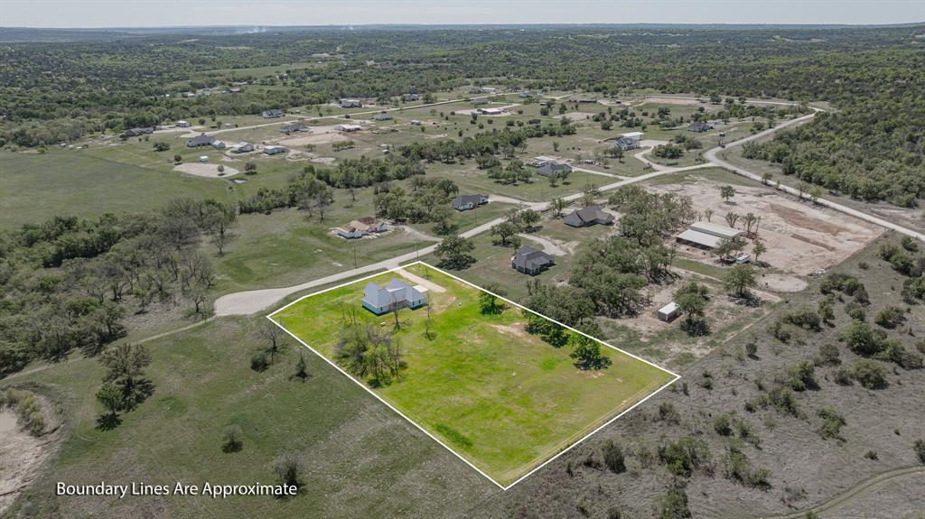 445 Rodeo Way Stephenville, TX 76401 - Photo 23 of 40 a view of a tennis court