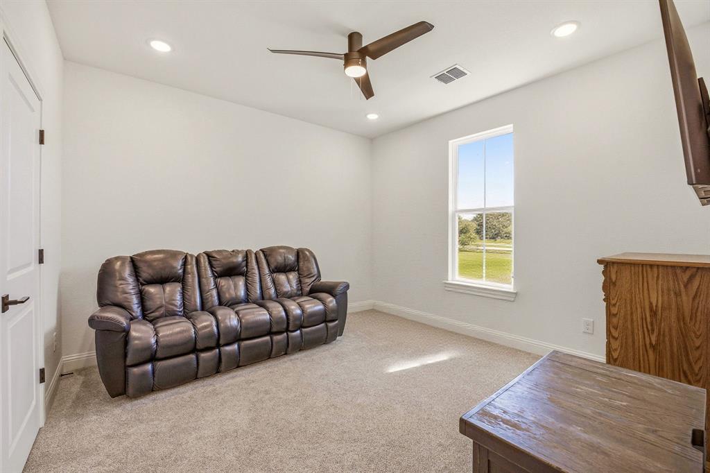 445 Rodeo Way Stephenville, TX 76401 - Photo 29 of 40 a living room with furniture