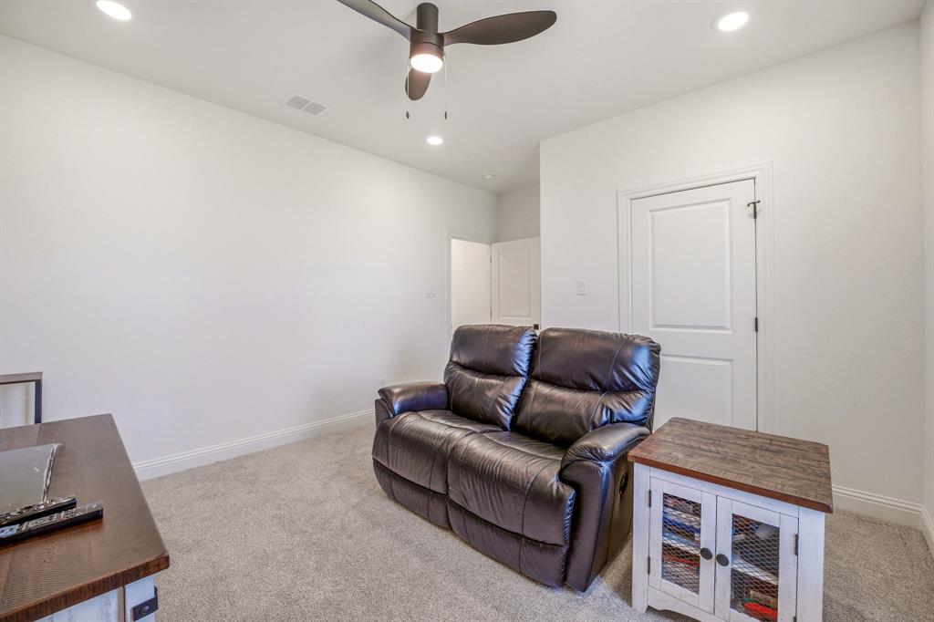 445 Rodeo Way Stephenville, TX 76401 - Photo 33 of 40 a living room with furniture