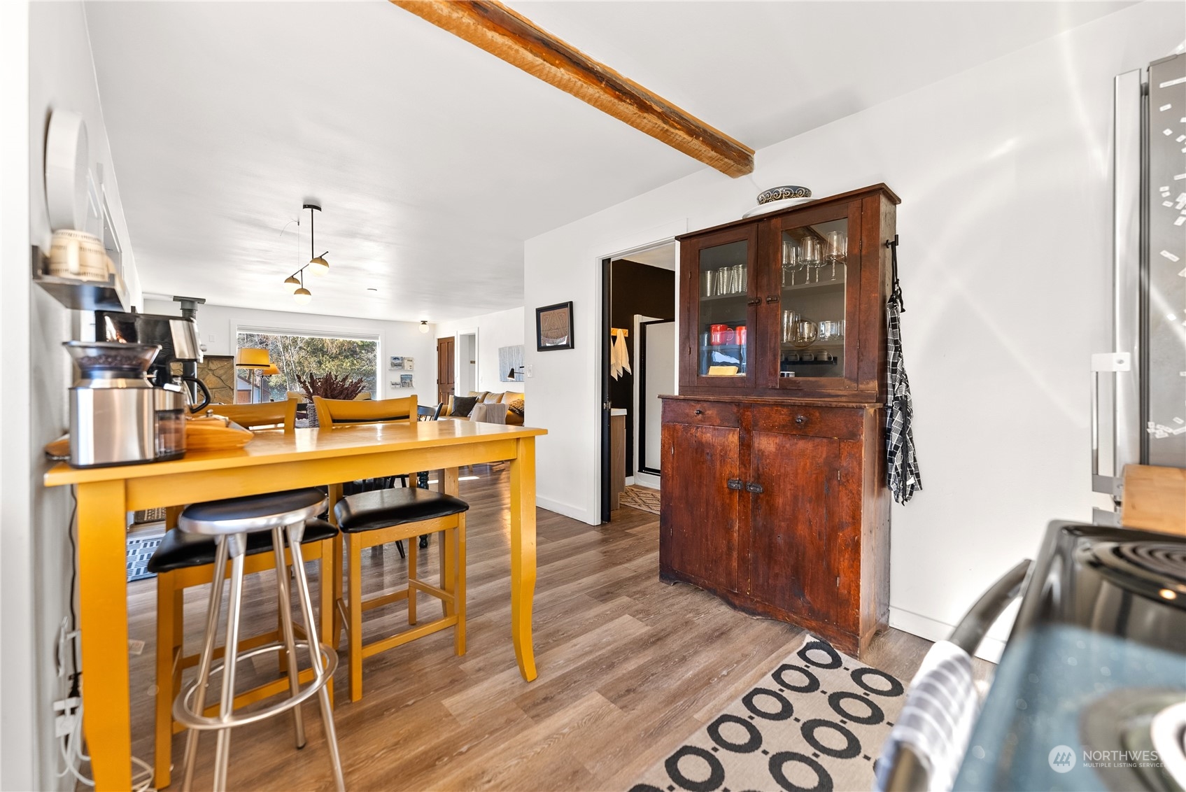 238 Castle Avenue Winthrop, WA 98862 - Photo 12 of 40 a kitchen with stainless steel appliances granite countertop a stove and a refrigerator