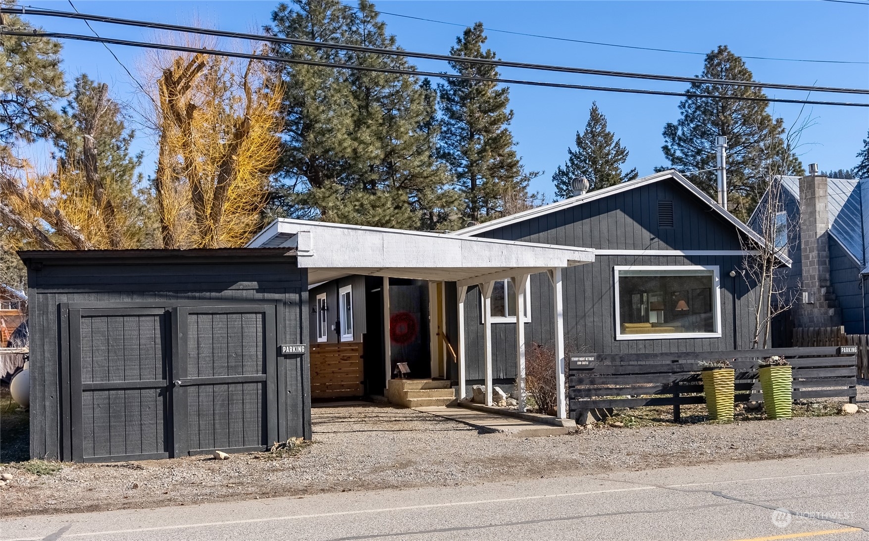 238 Castle Avenue Winthrop, WA 98862 - Photo 2 of 40 a front view of a house with garden