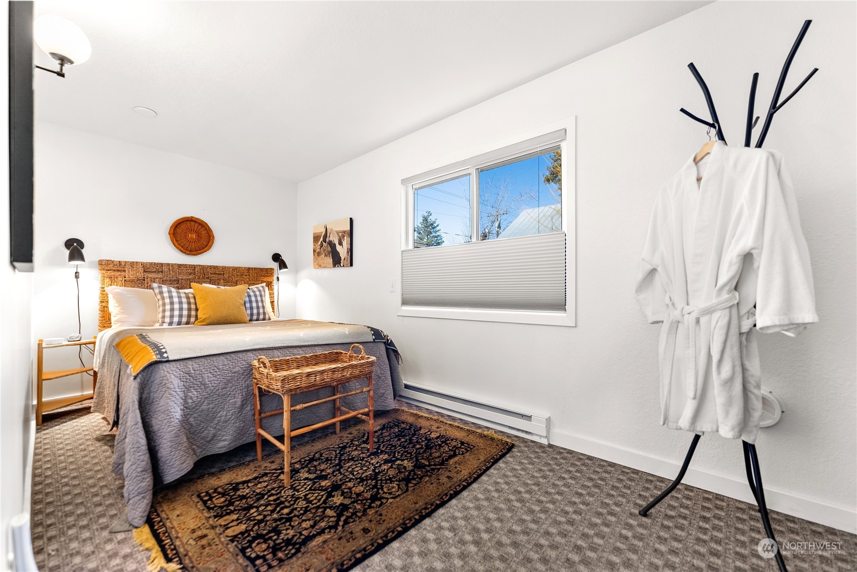 238 Castle Avenue Winthrop, WA 98862 - Photo 21 of 40 a bedroom with a bed and a window