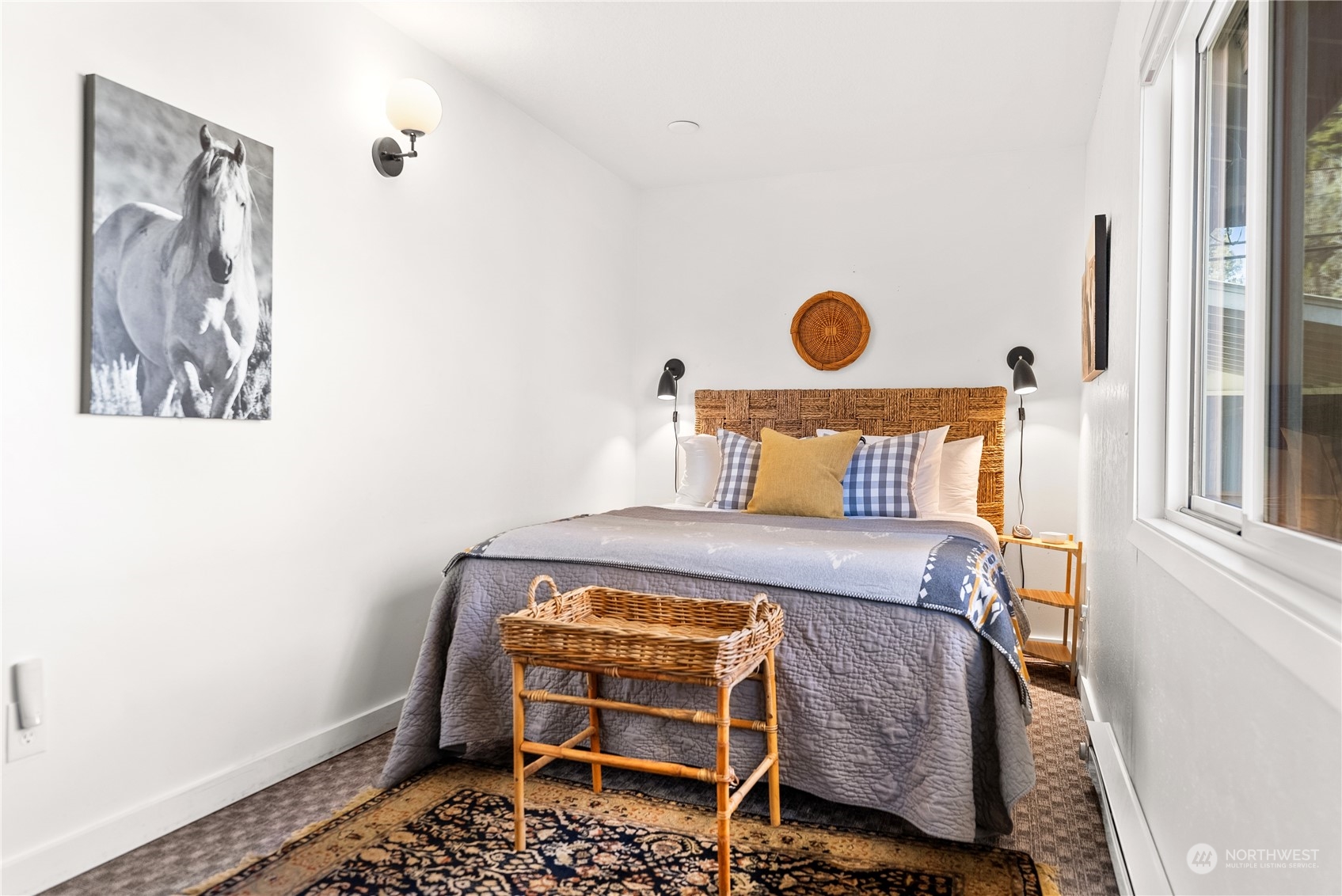 238 Castle Avenue Winthrop, WA 98862 - Photo 22 of 40 a bedroom with a bed and a window