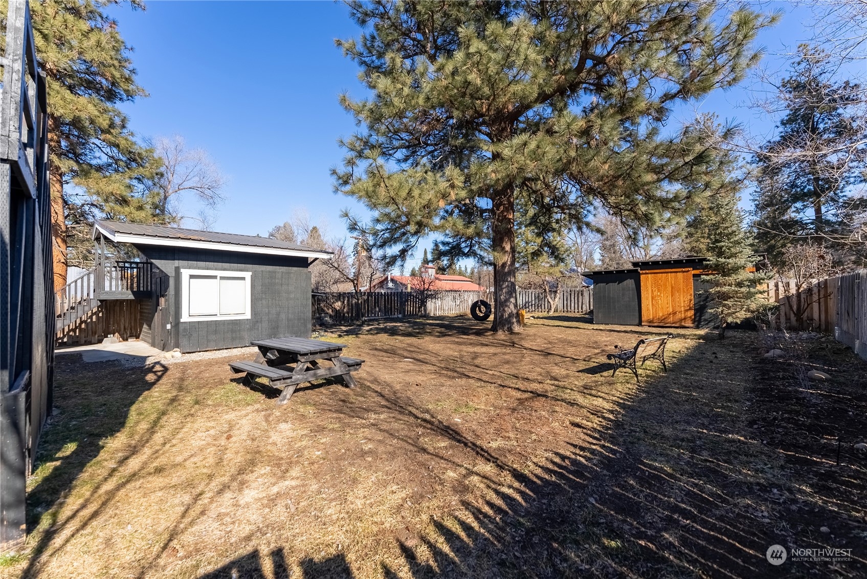 238 Castle Avenue Winthrop, WA 98862 - Photo 29 of 40 a view of a house with backyard and sitting area