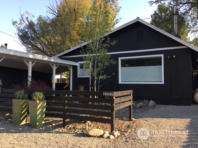 238 Castle Avenue Winthrop, WA 98862 - Photo 39 of 40 a front view of a house with garden