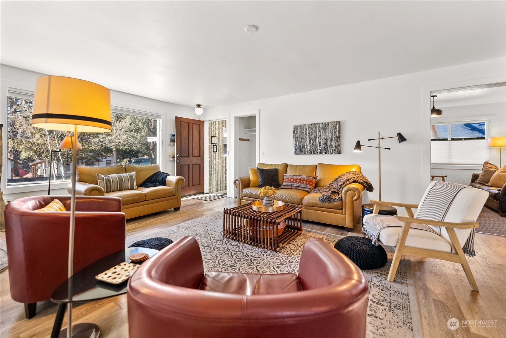 238 Castle Avenue Winthrop, WA 98862 - Photo 5 of 40 a living room with furniture and a flat screen tv