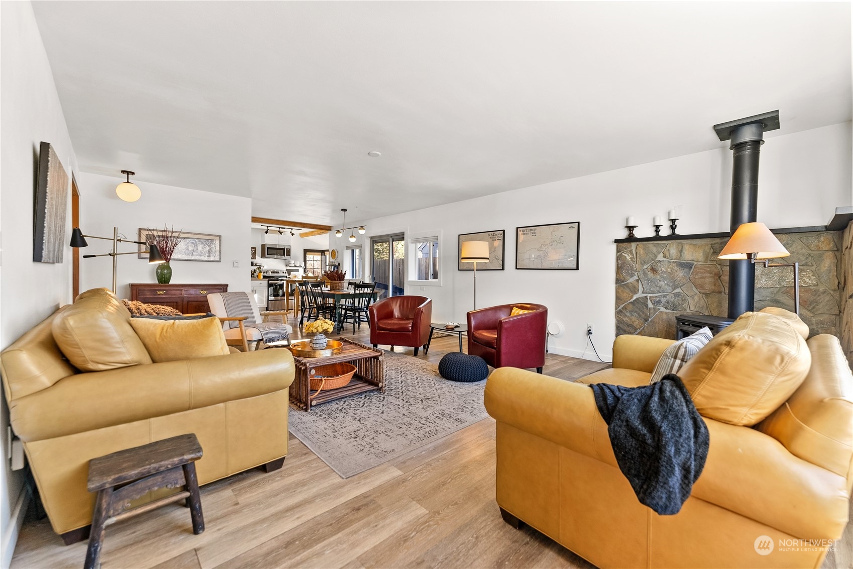 238 Castle Avenue Winthrop, WA 98862 - Photo 6 of 40 a living room with furniture and a fireplace