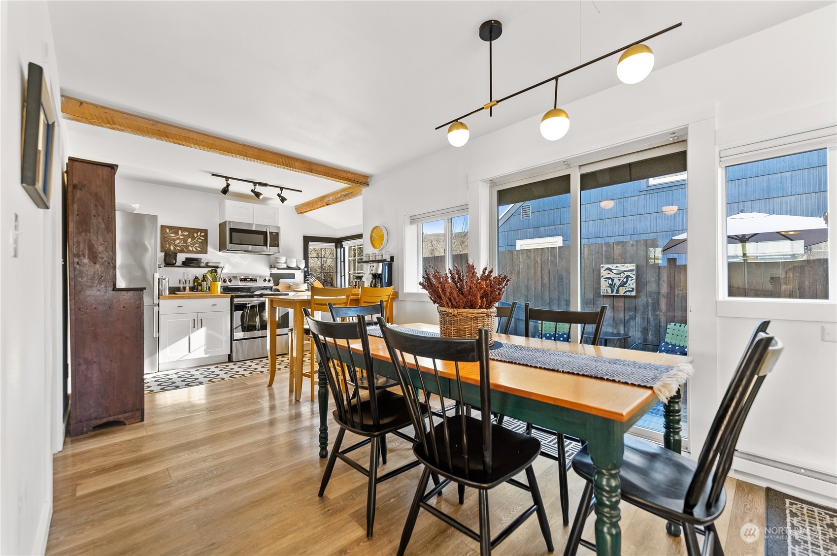 238 Castle Avenue Winthrop, WA 98862 - Photo 8 of 40 a view of a dining room with furniture and wooden floor
