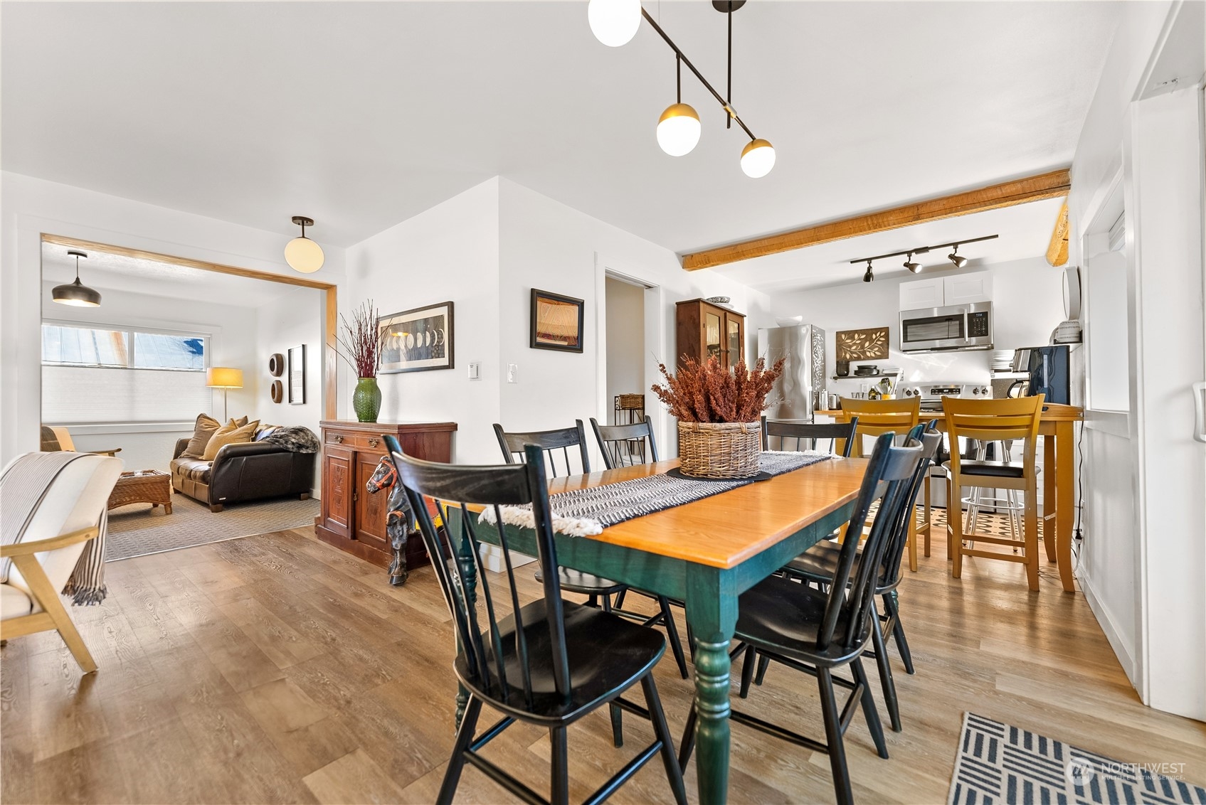 238 Castle Avenue Winthrop, WA 98862 - Photo 9 of 40 a view of a dining room with furniture and wooden floor