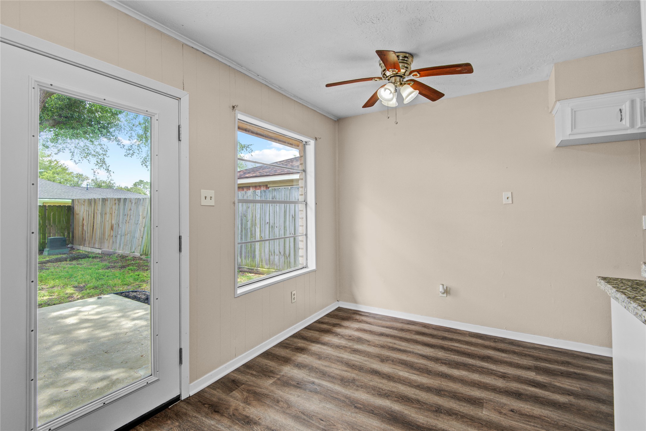1230 Epsilon Street Pasadena, TX 77504 - Photo 11 of 27 a view of a livingroom with a ceiling fan and window
