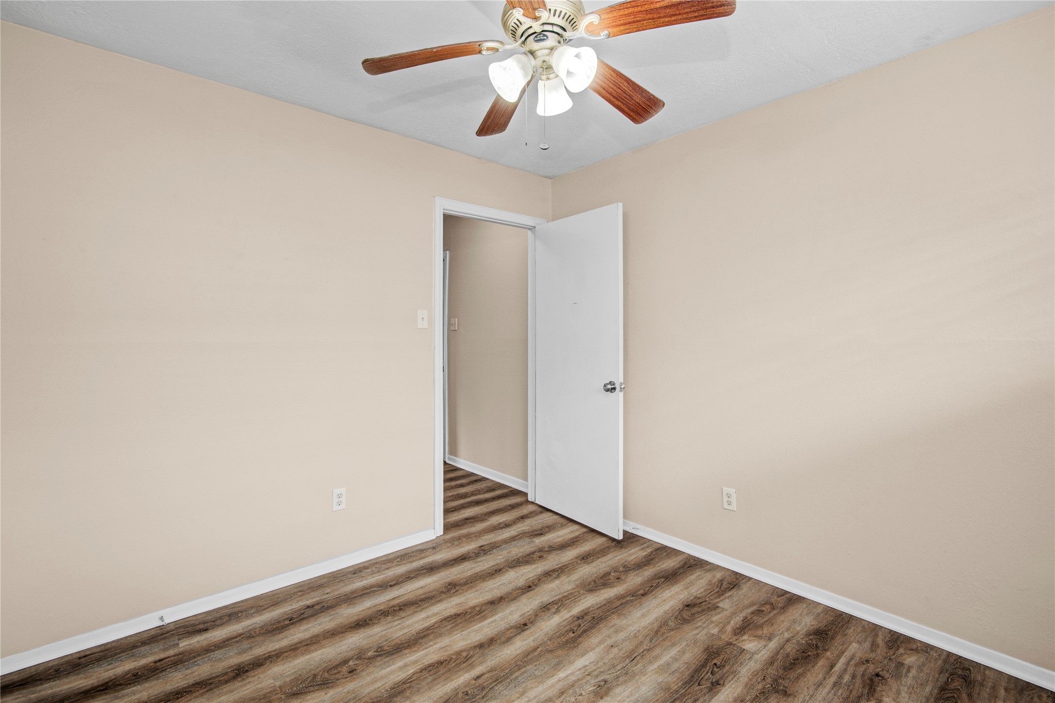1230 Epsilon Street Pasadena, TX 77504 - Photo 18 of 27 a view of a room with wooden floor and closet