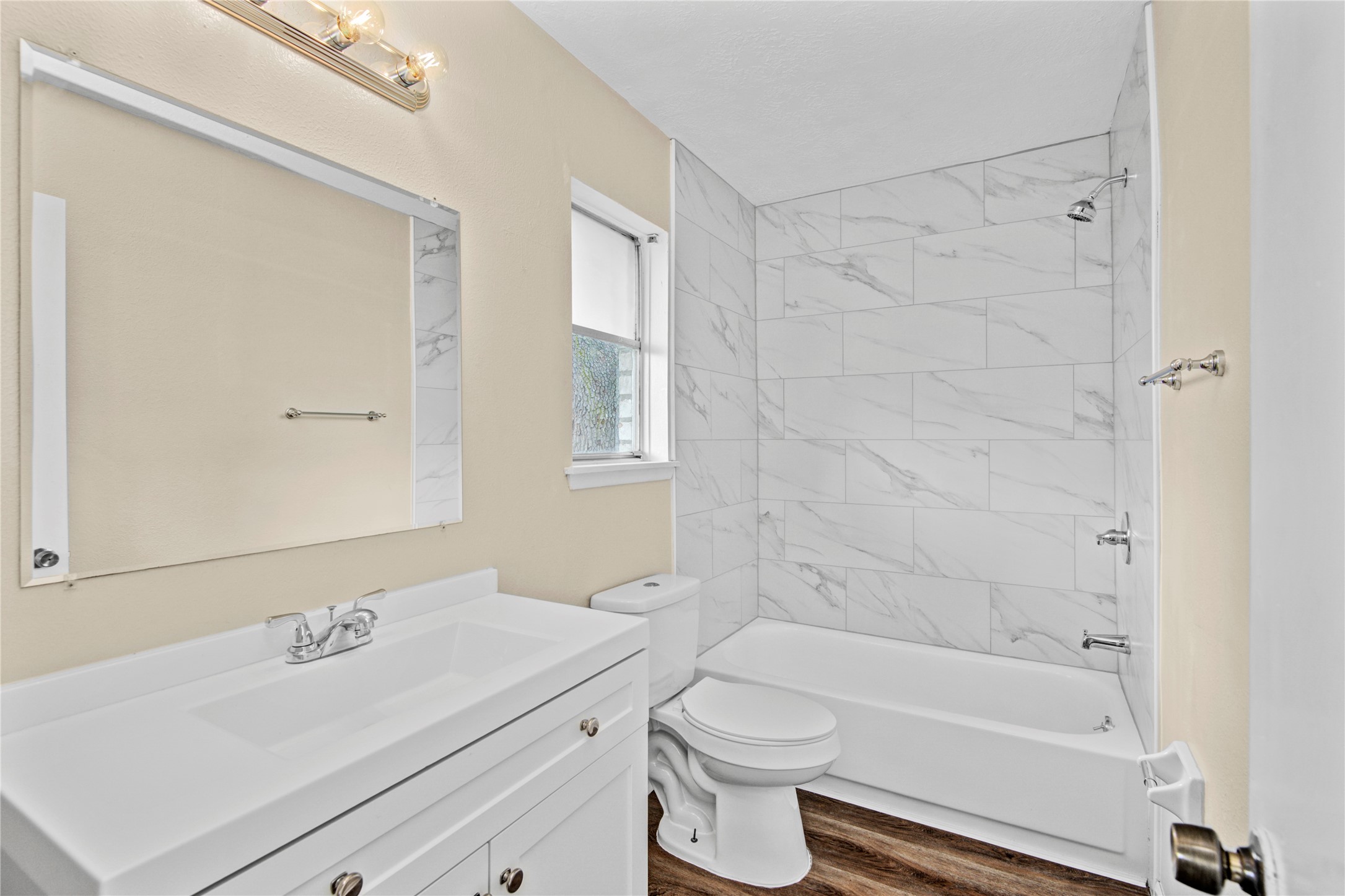 1230 Epsilon Street Pasadena, TX 77504 - Photo 23 of 27 a bathroom with a sink a toilet and shower