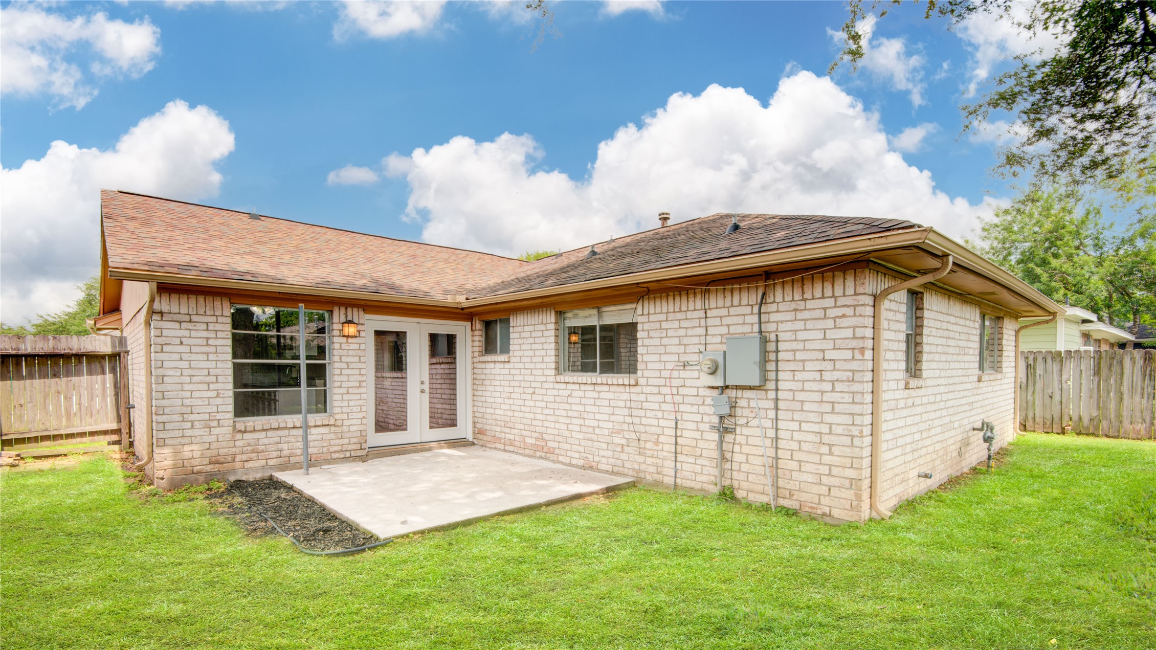 1230 Epsilon Street Pasadena, TX 77504 - Photo 25 of 27 a view of a house with a yard
