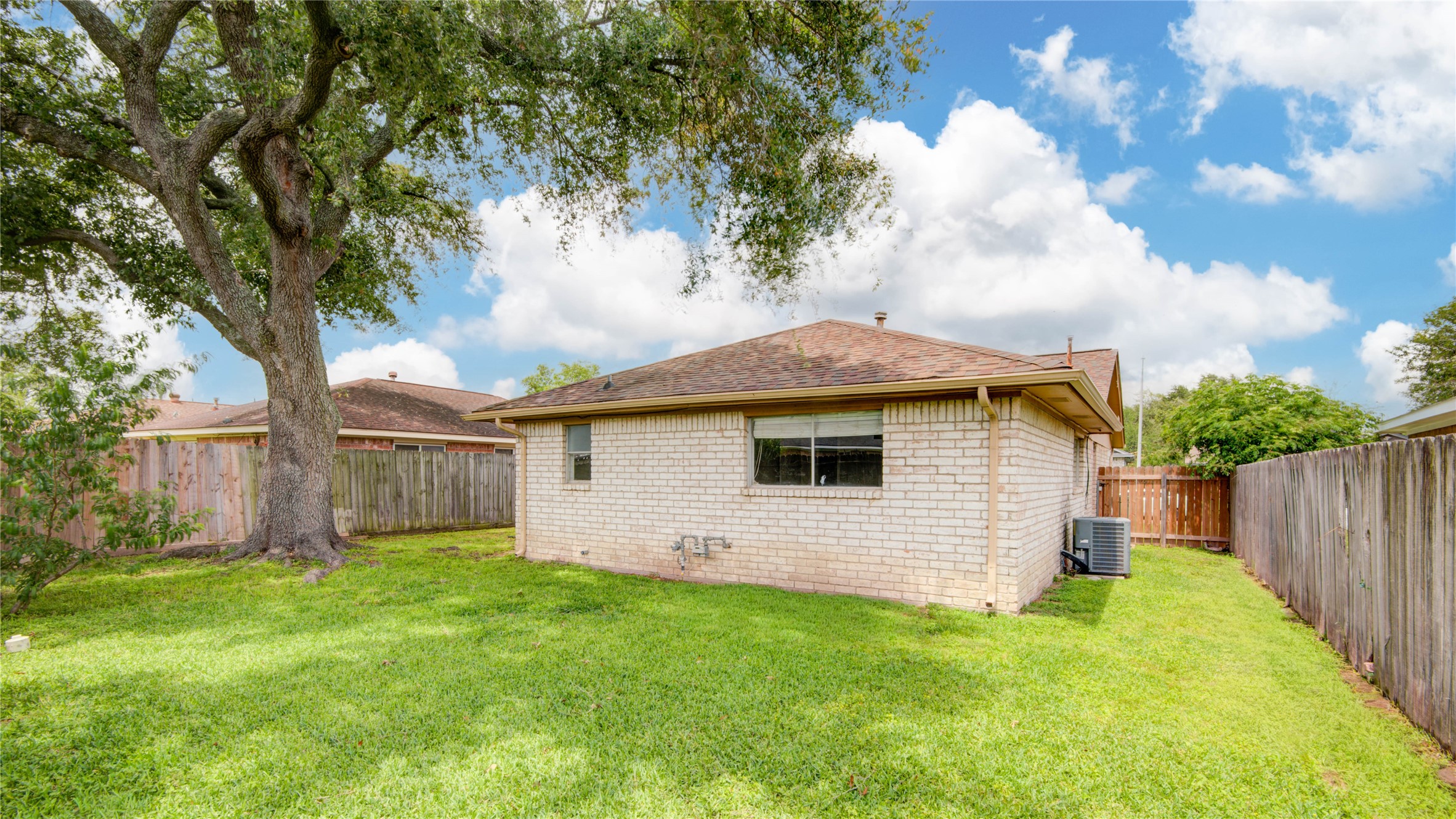 1230 Epsilon Street Pasadena, TX 77504 - Photo 27 of 27 a white house that has tree in front of it