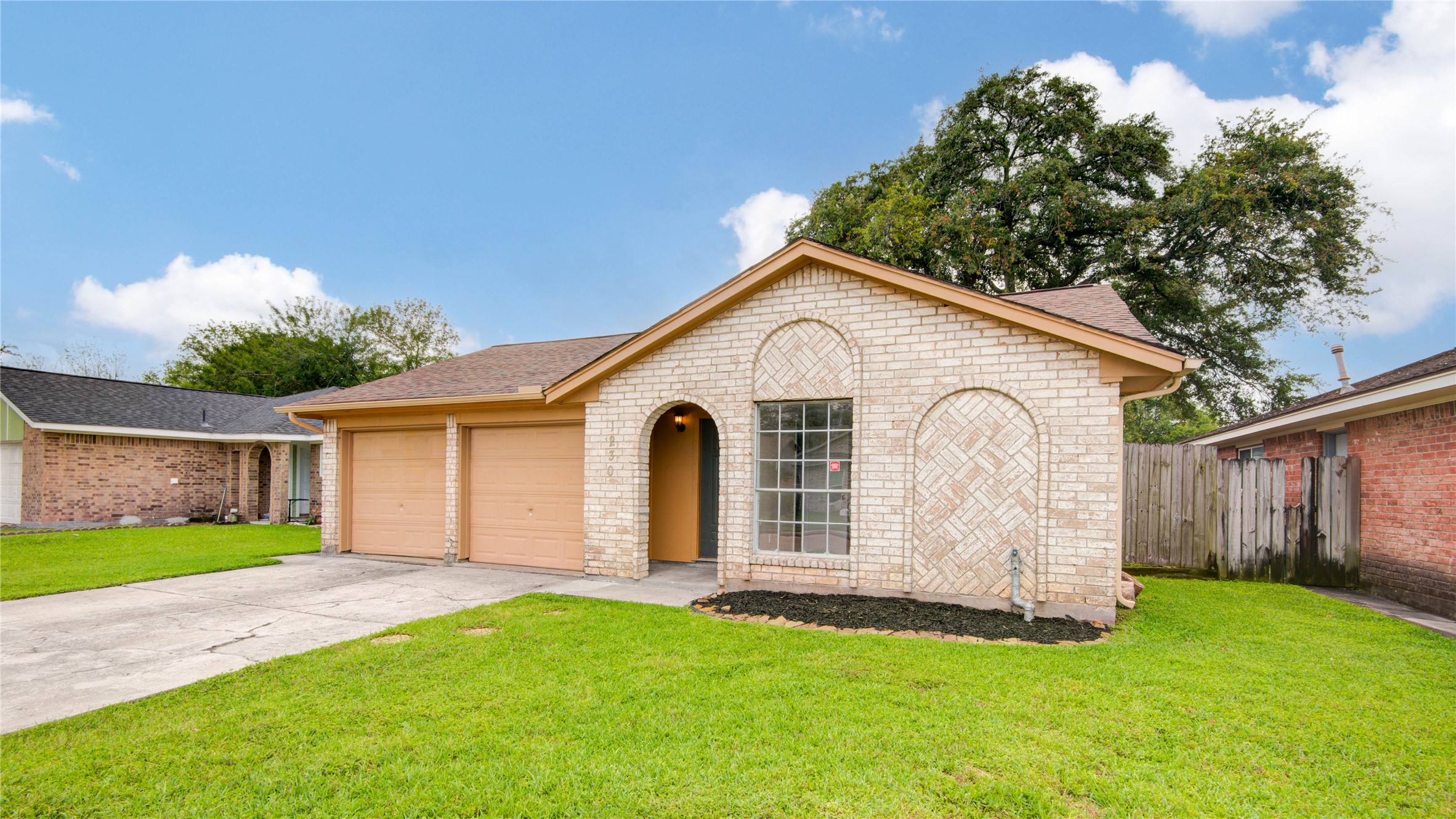 1230 Epsilon Street Pasadena, TX 77504 - Photo 3 of 27 a view of a backyard with a garden